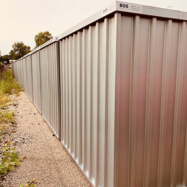 A row of assembled containers from behind. They can provide a nice wall, or fence.